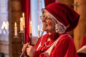 Mrs Santa Claus in Mrs. Santa Claus Christmas Cottage in Rovaniemi, Finland